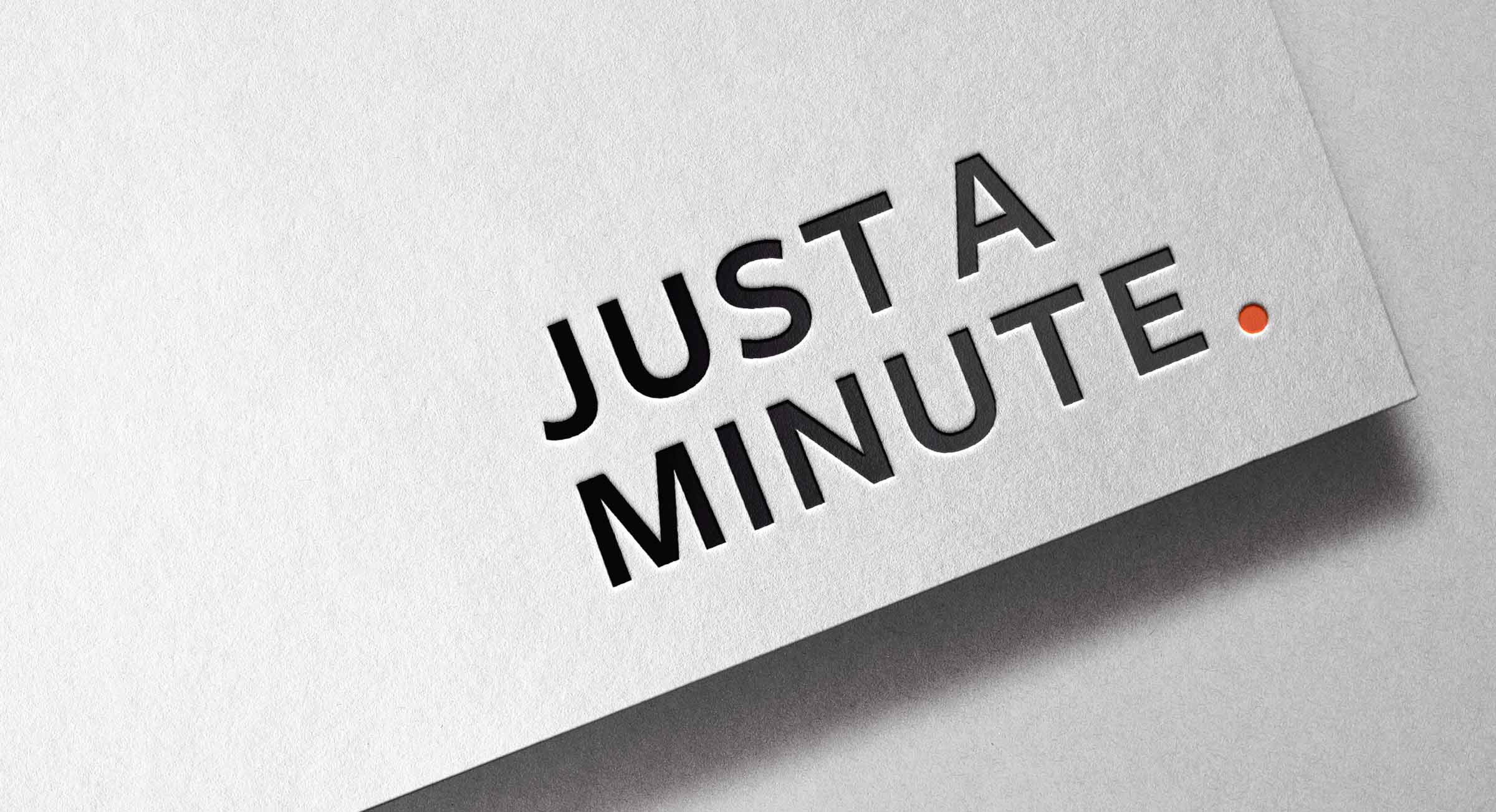 'just a minute' logo mockup